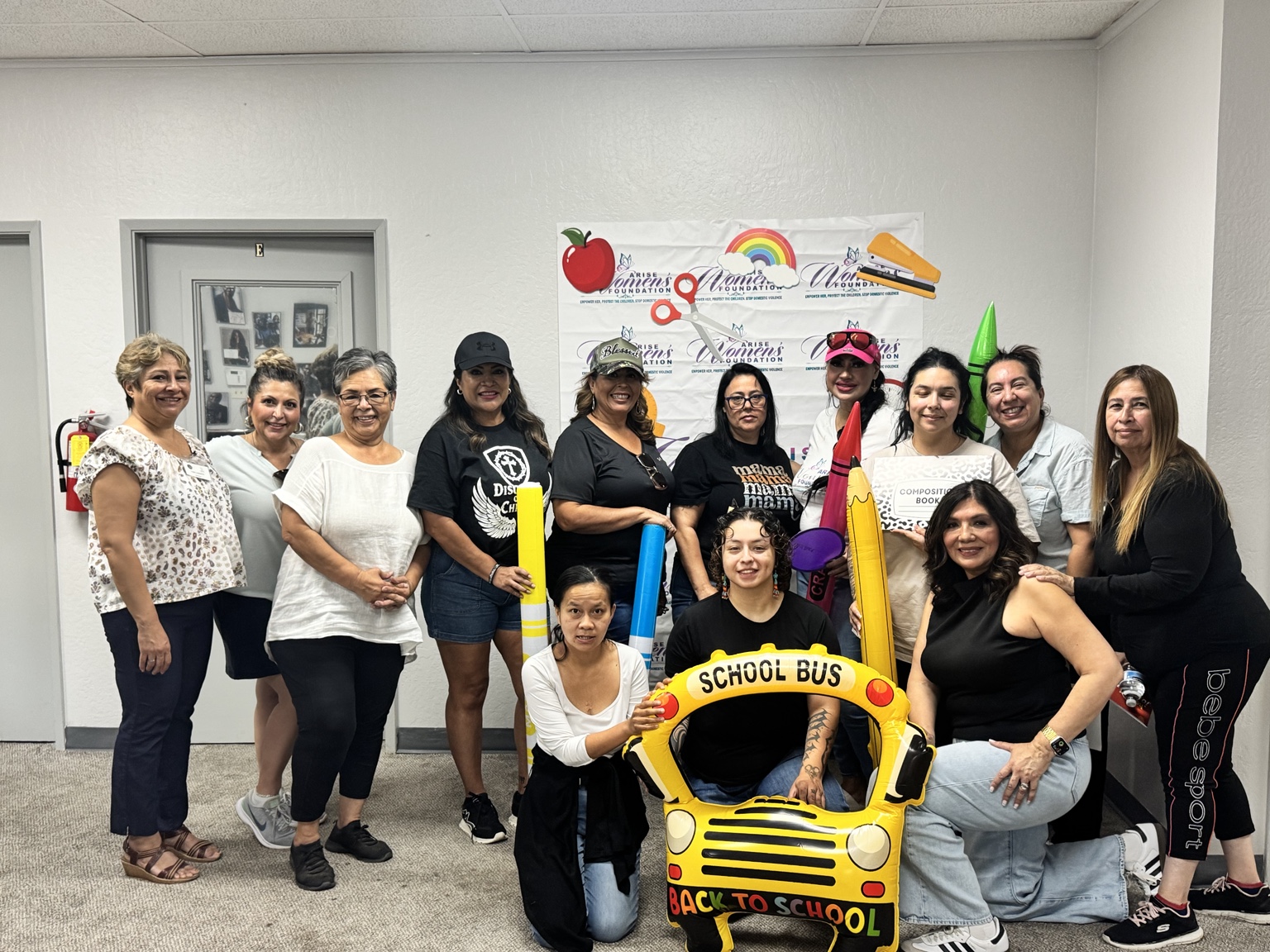 Arise Women’s Foundation volunteers gathered at the annual backpack drive